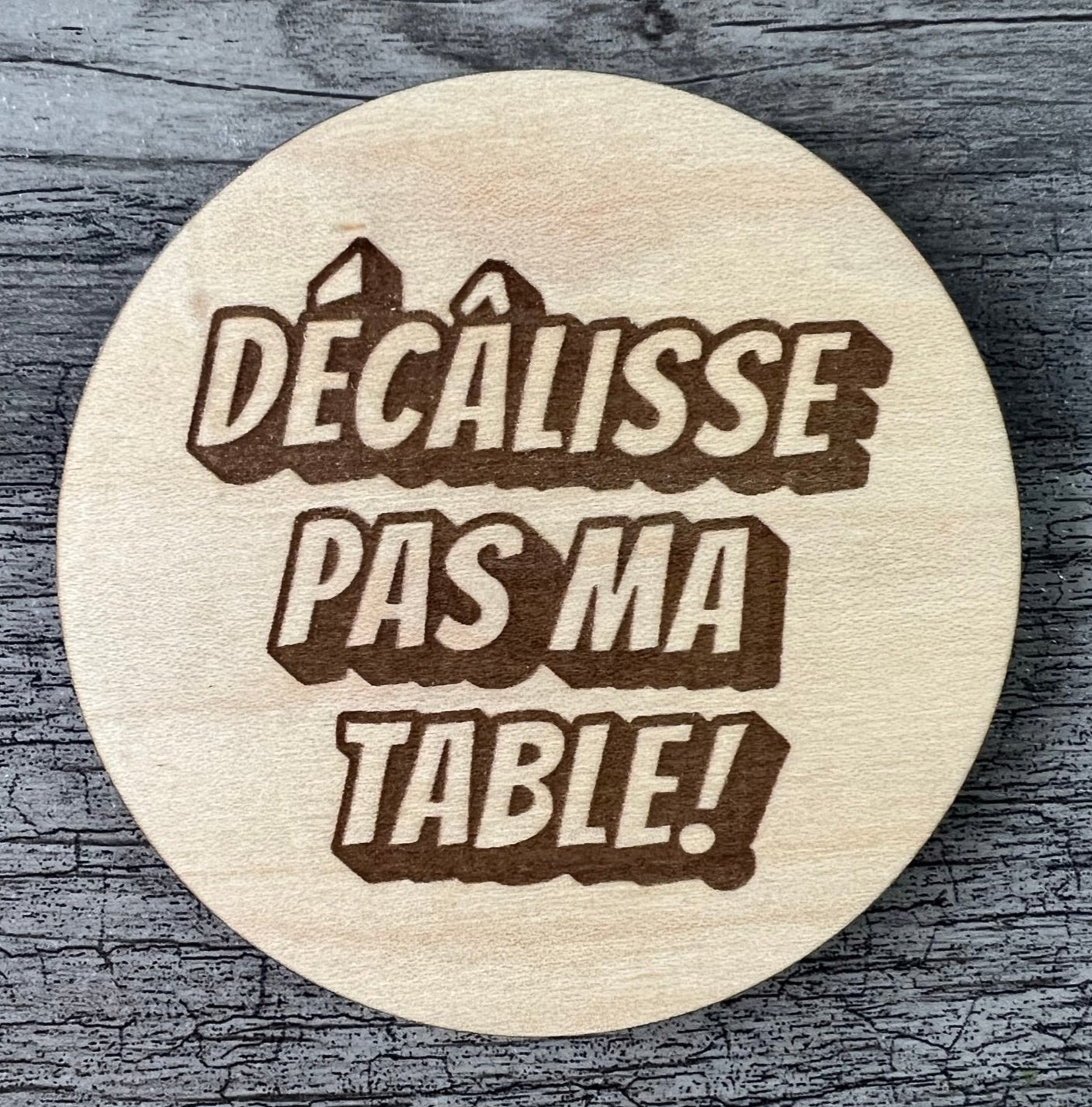 Un Sous-verres "Décâlisse pas ma table!"