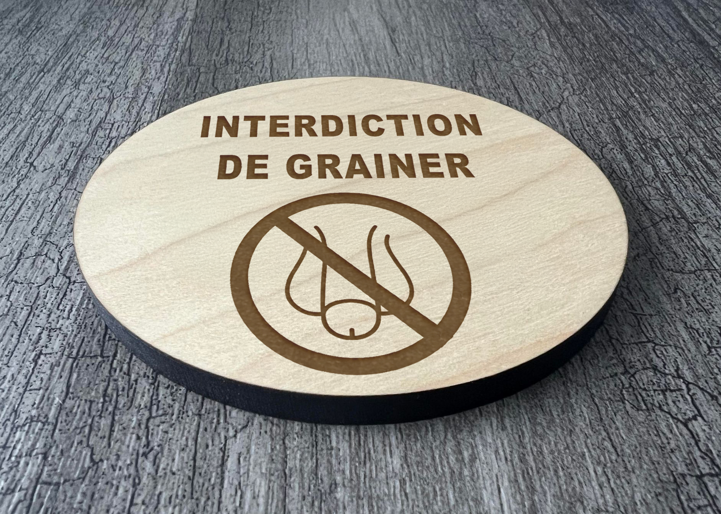 Un Sous-verres "Interdiction de grainer"