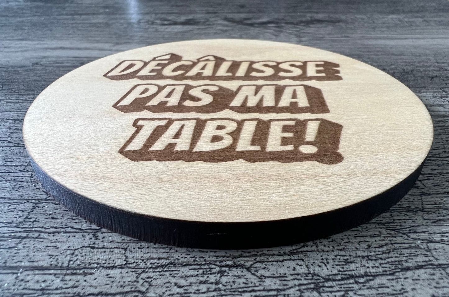 Un Sous-verres "Décâlisse pas ma table!"